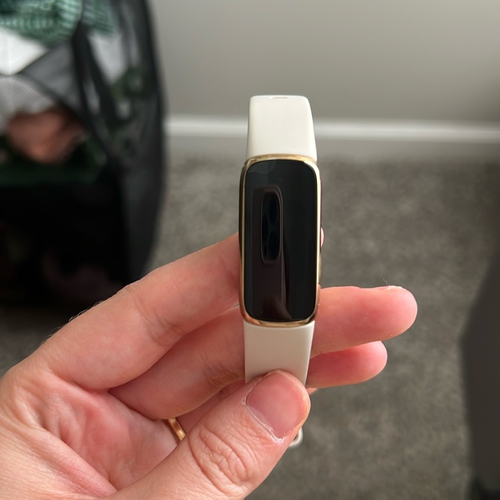 Fit Bit only used a handful of times and in great condition. Charger included